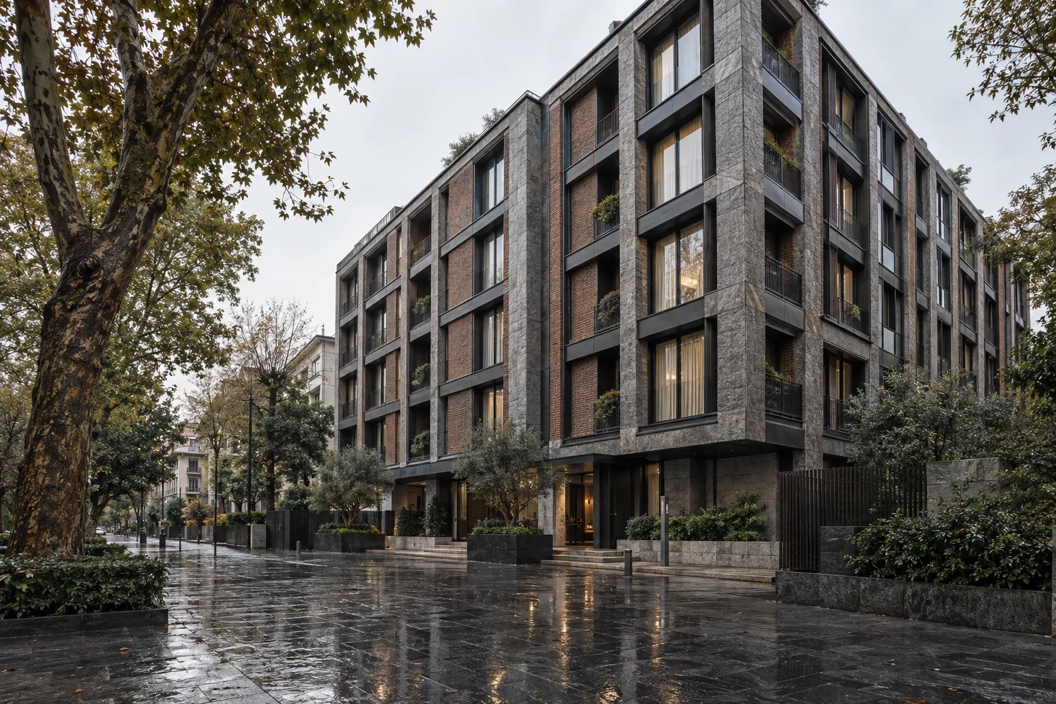Ağaçlı sokakta nitelikli apartman yapısı